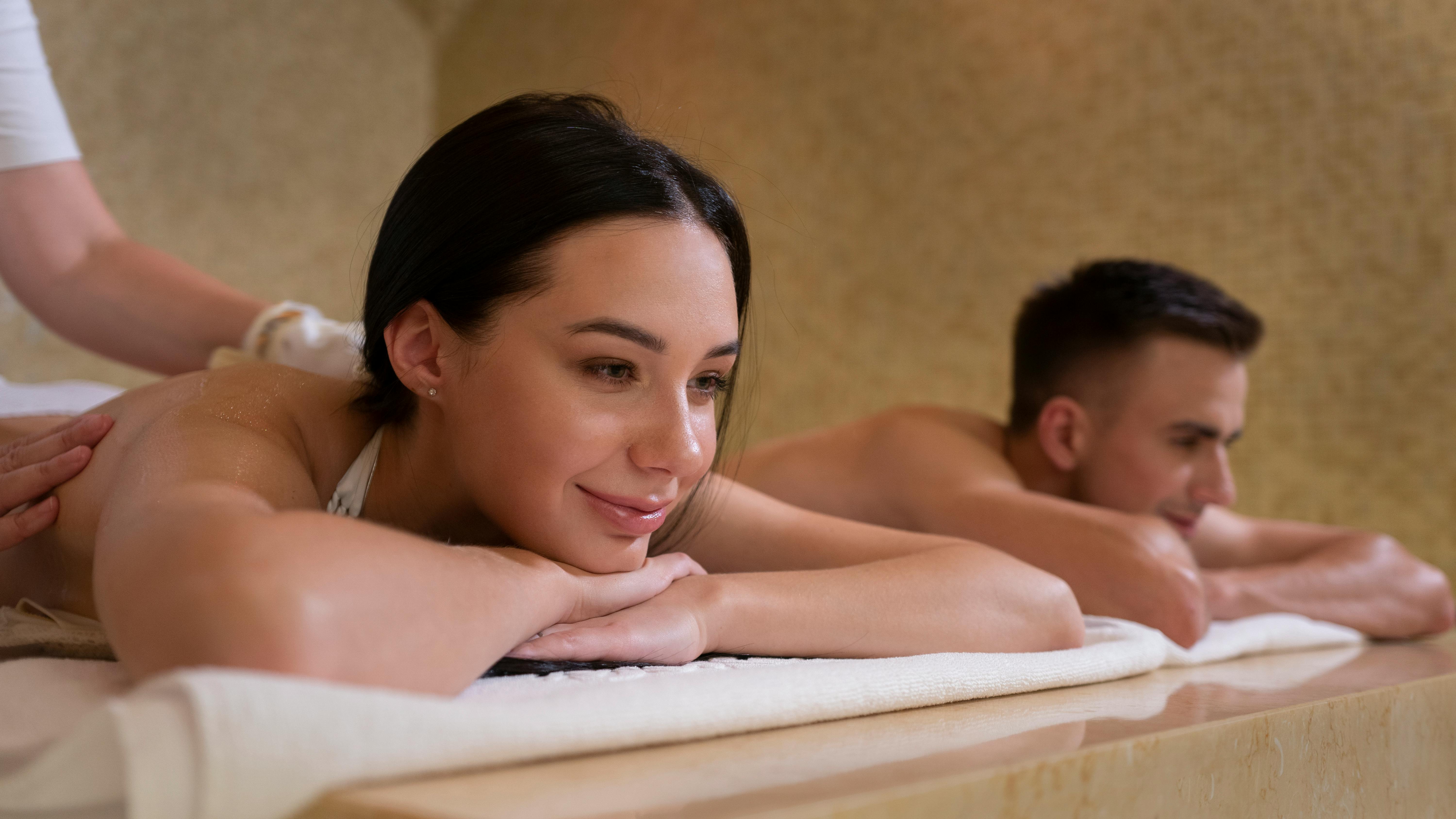 Professional couple massage therapy session